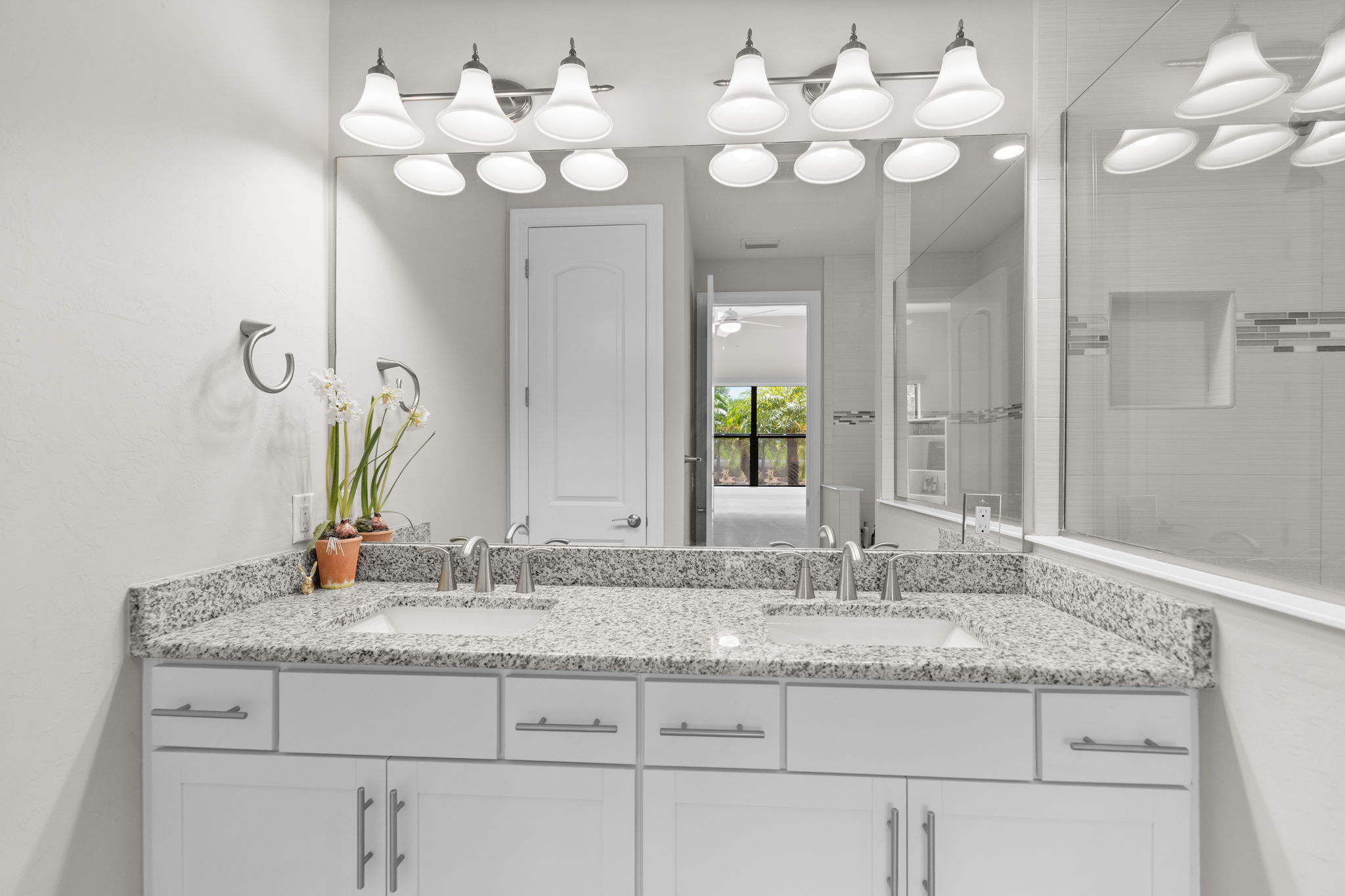 Double sink vanity with granite countertops
