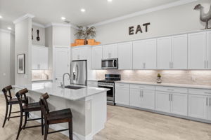Stainless steel appliances and under cabinet lighting