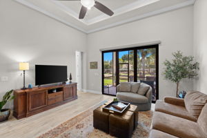 Living room with sliding glass doors overlooking the lake