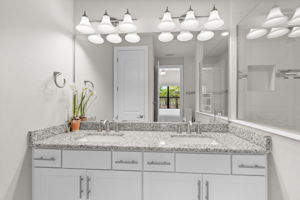 Double sink vanity with granite countertops