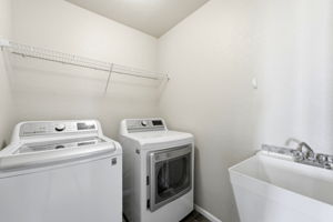 Upstairs Laundry with Washer, Dryer, Sink