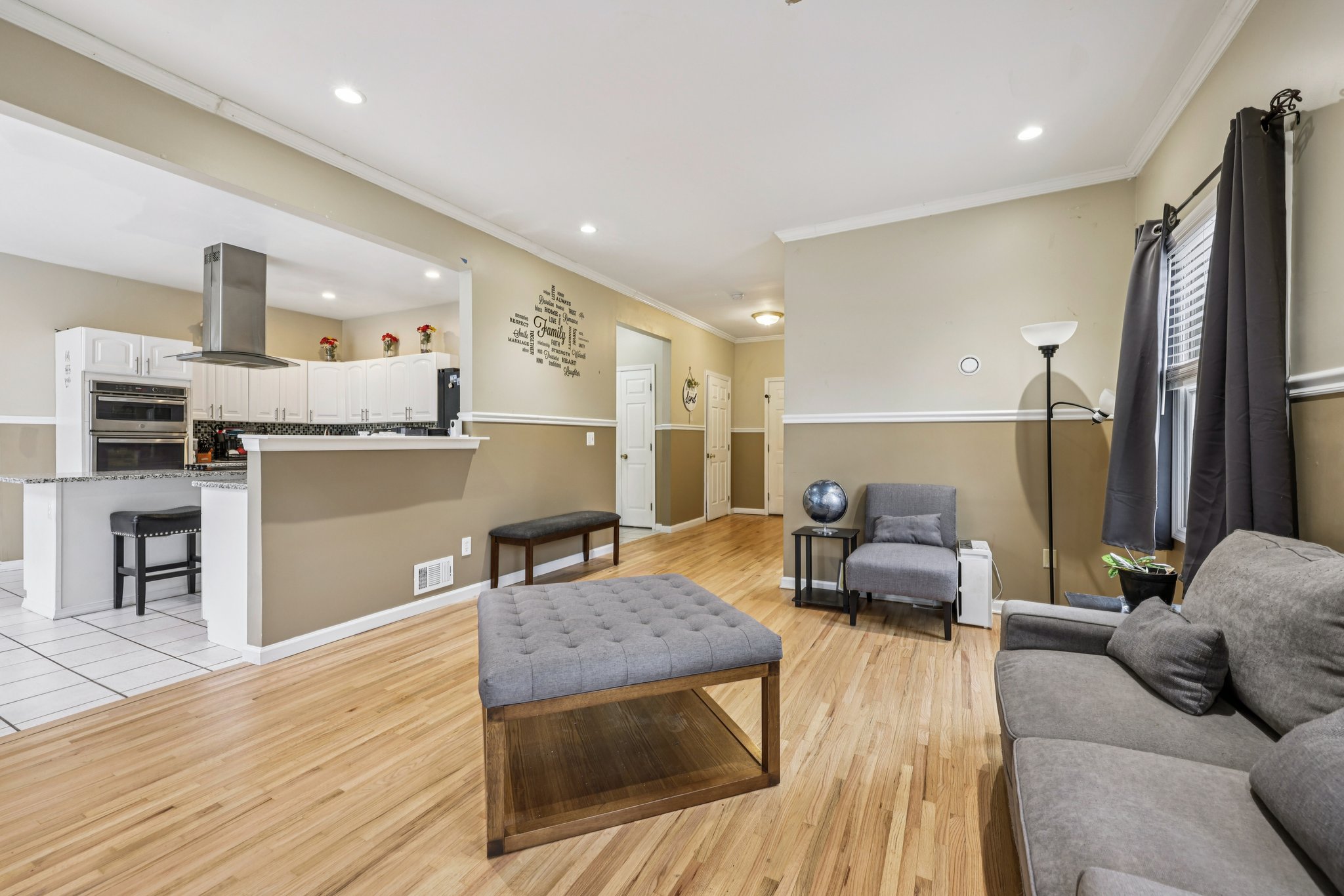 Rear of living room is foyer to 2 car garage
