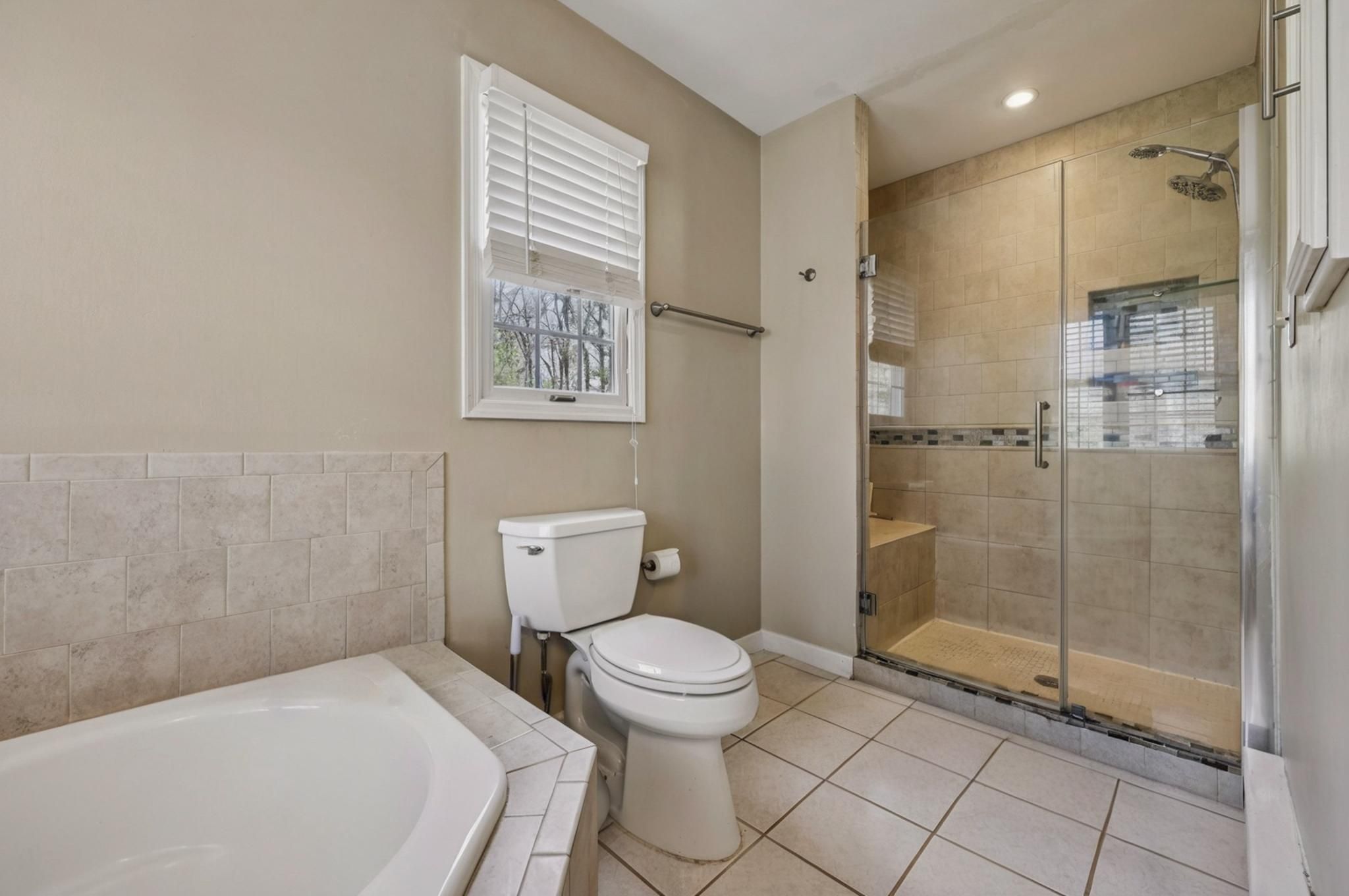 Master bathroom with stall shower