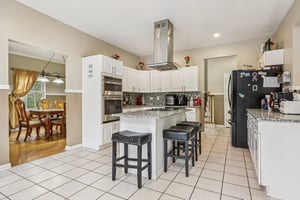 Large main kitchen with seperate eating area