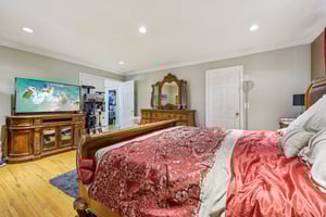 Double doors leading to Master bedroom with walk in closet