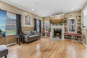 Extra large living room with fireplace and built in window seats