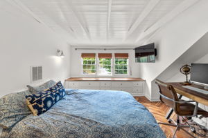 25. Upper bedroom