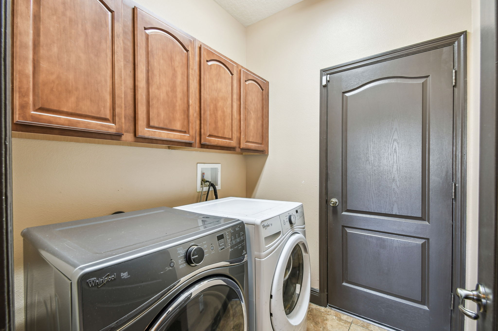 Laundry Room with Storage Cabinets