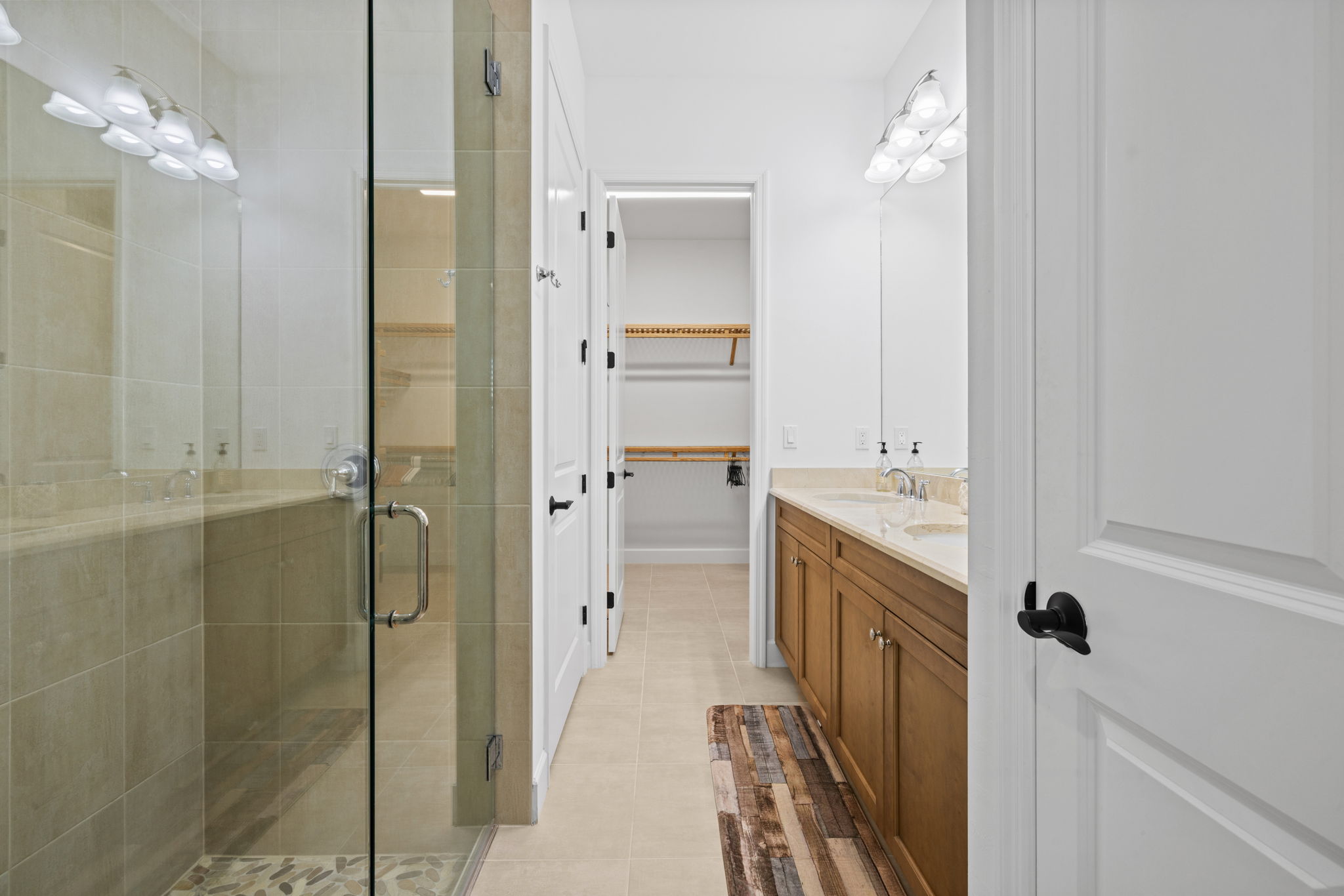 Rock tile shower floor w built in features.