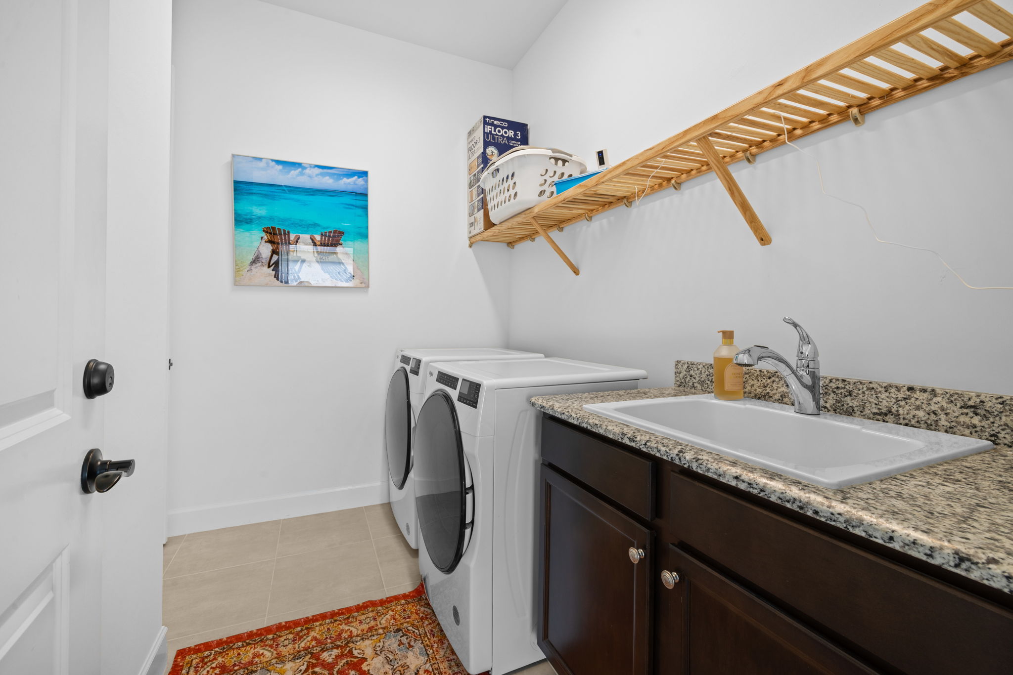 Great laundry room with large laundry sink