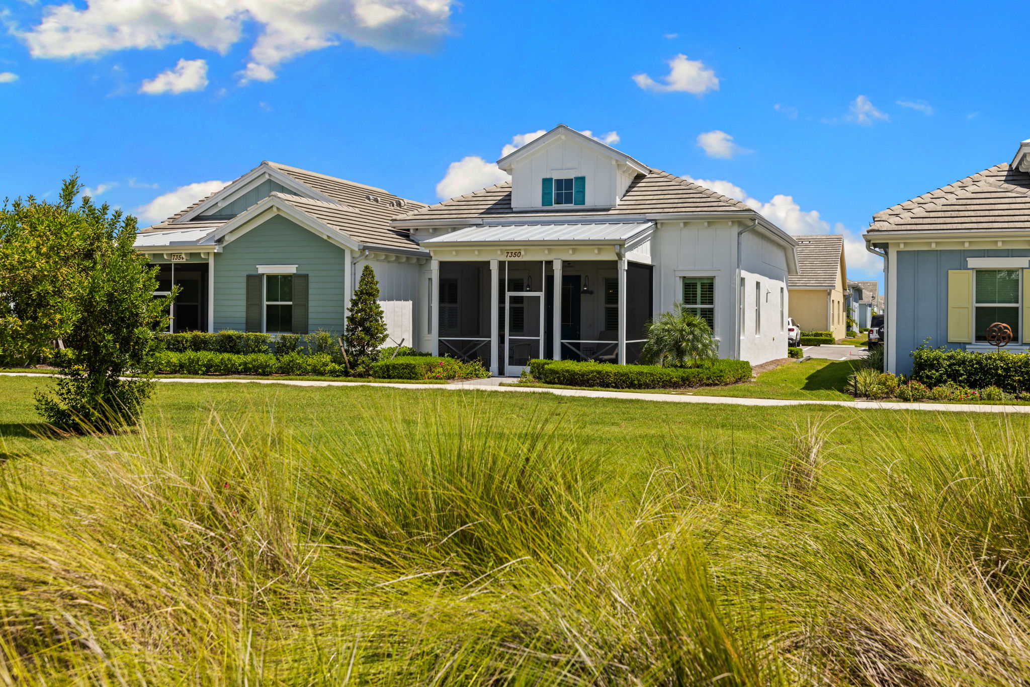 Expansive front lawn great for activities.