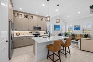 Expansive Island and tile backsplash.