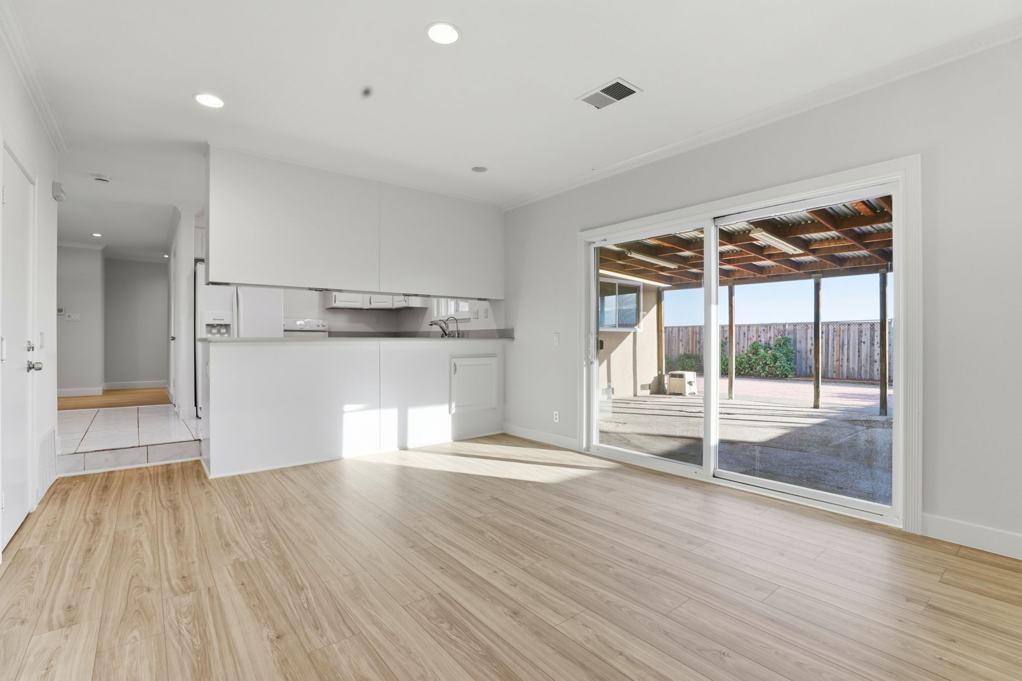 Newer Luxury Vinyl Plank Flooring in Family Room!!