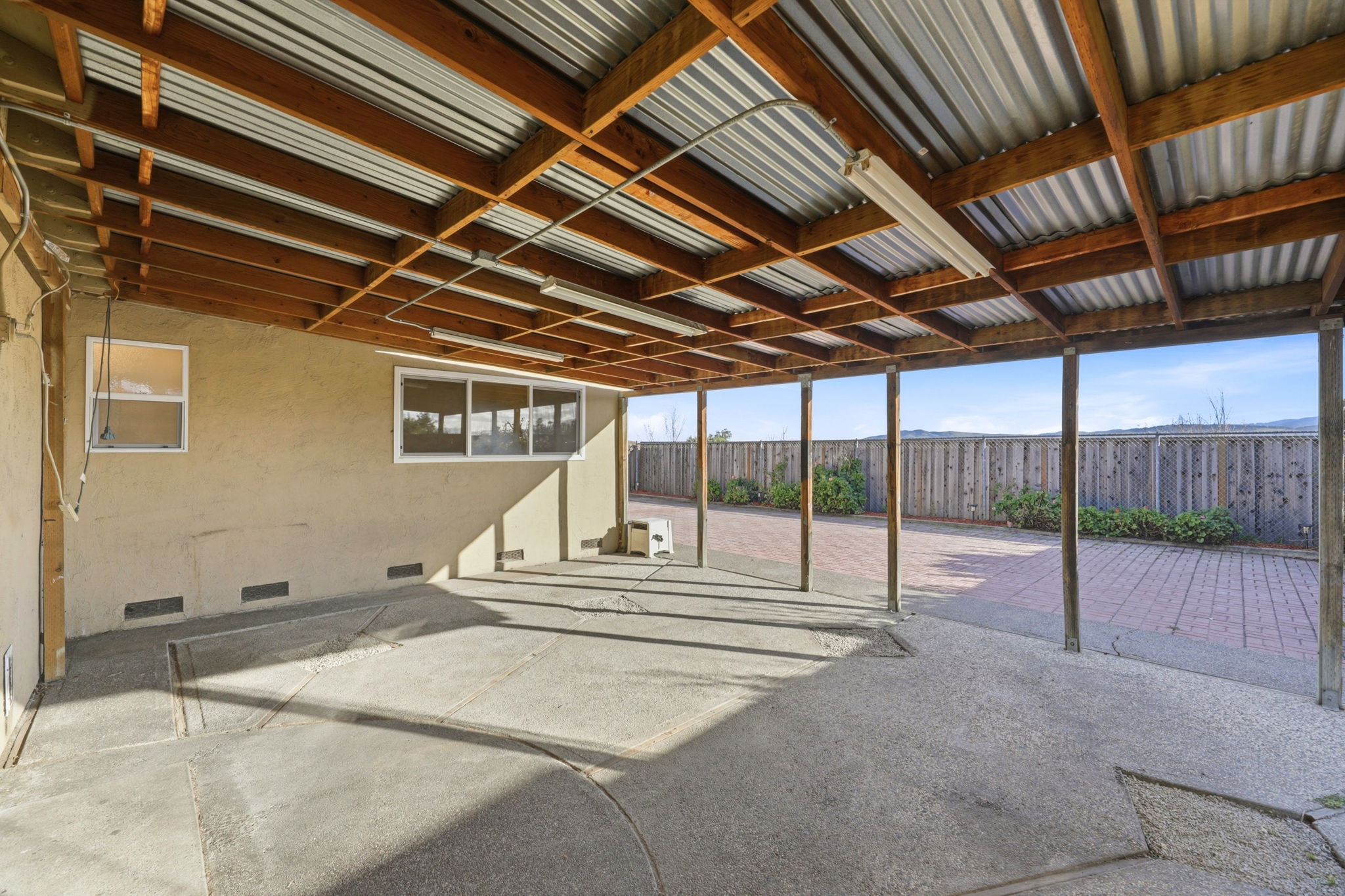 Ample Outdoor Space with Covered Awning for Entertaining!!