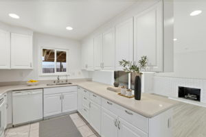 Lots of Kitchen Cabinet Space for Storage in All-White Kitchen!! (Virtually Staged)