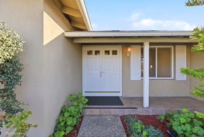 Appealing Double-Door Entry and E-Z Care Tile Porch!!