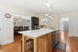 Kitchen with Custom Appliances and Quartz Island