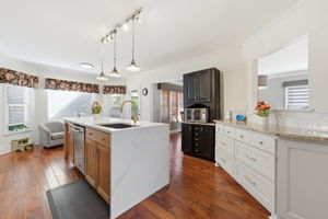 Kitchen with Custom Appliances and Quartz Island