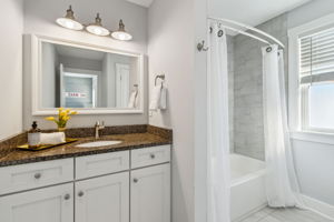 Shown here: the 3rd bedroom's ensuite bath, with shower/tub combination, linen closet, and toilet closet.