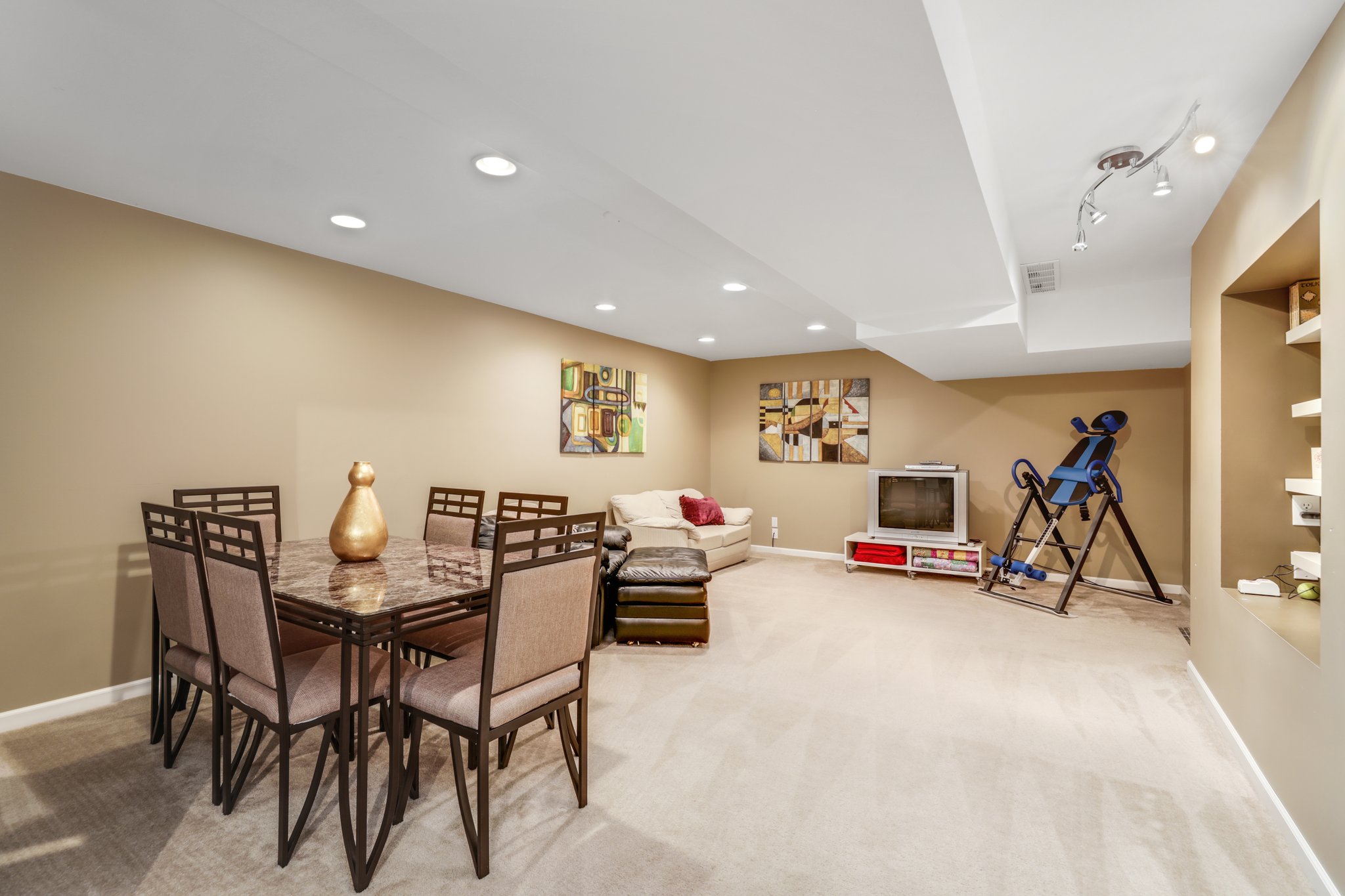 Finished basement with built in shelving