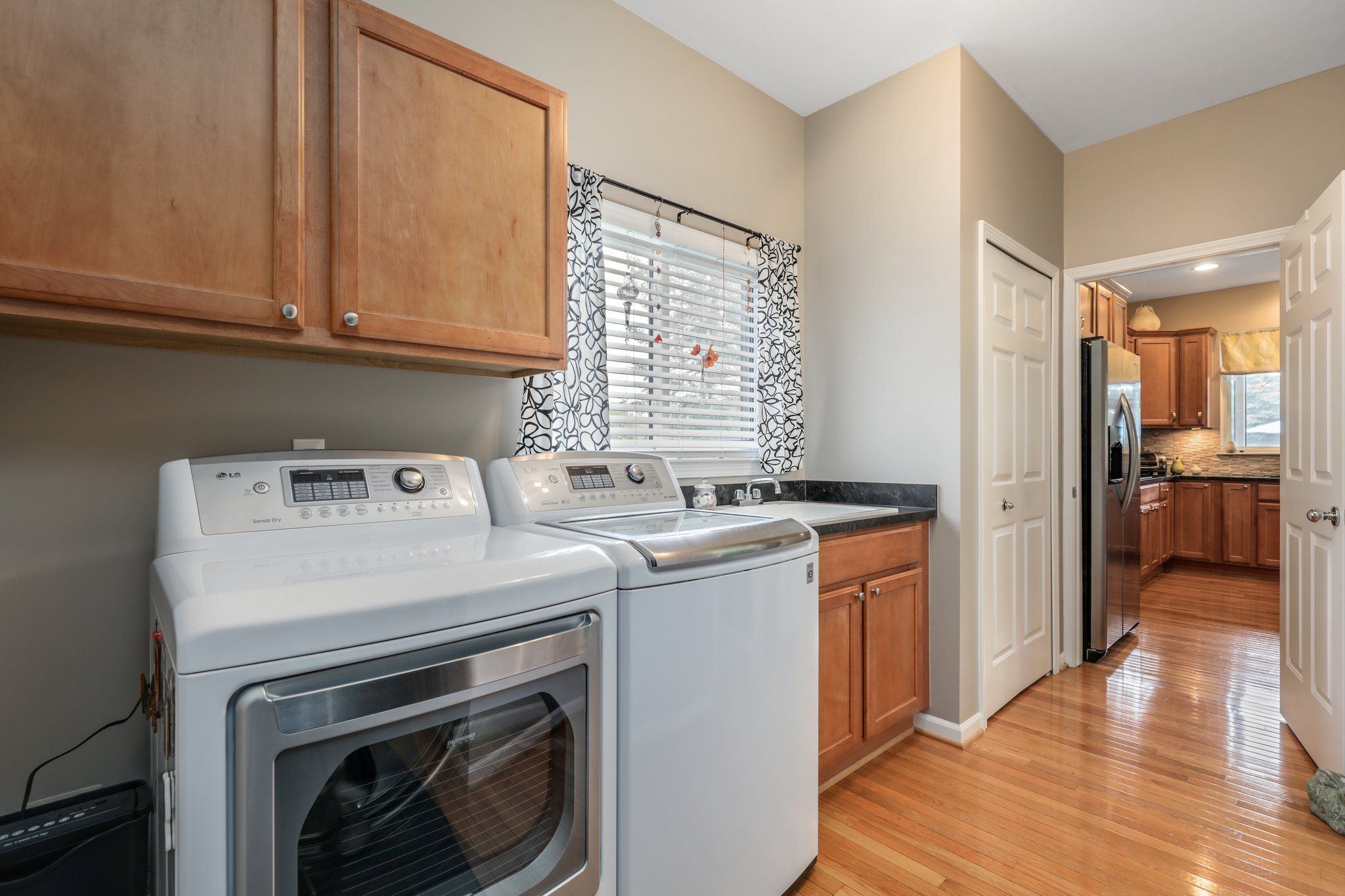 Laundry area with large closet
