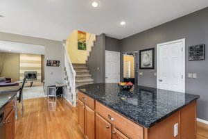 Dual direction stairs into kitchen