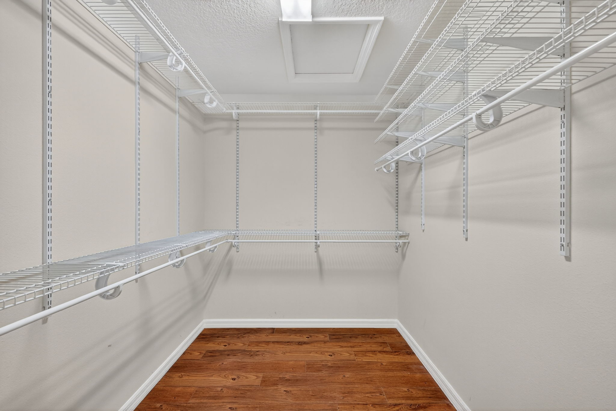 Primary Bedroom Walk-In Closet