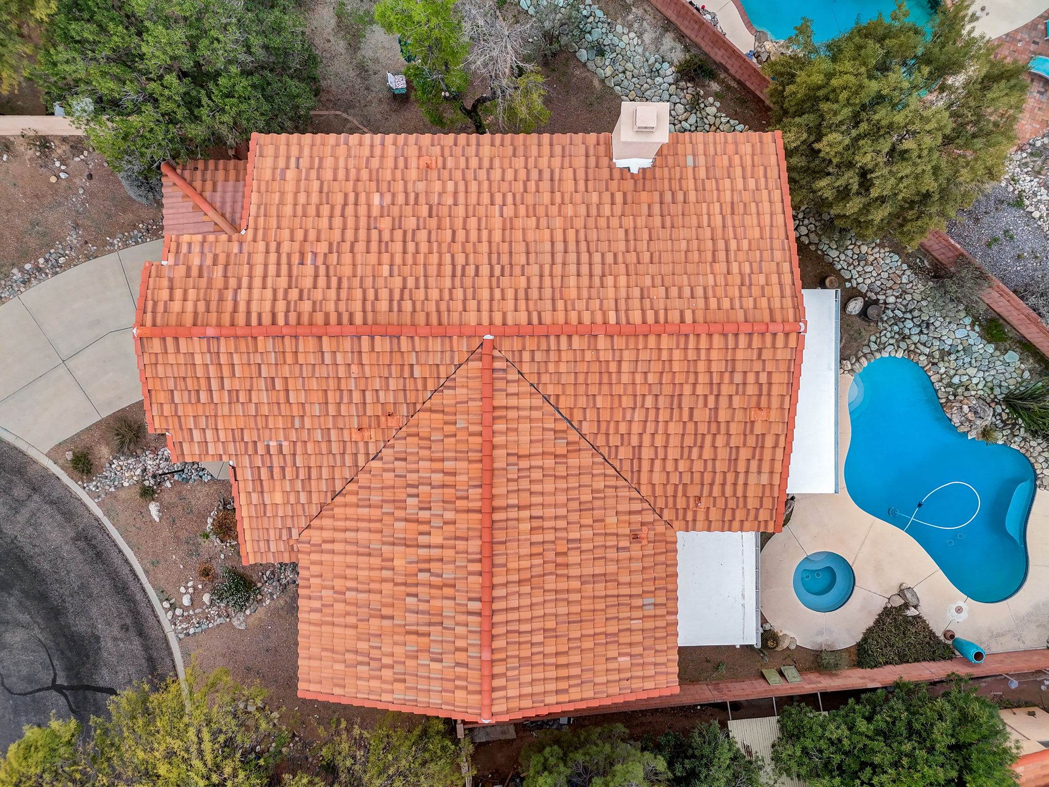 Drone view of roof and backyard