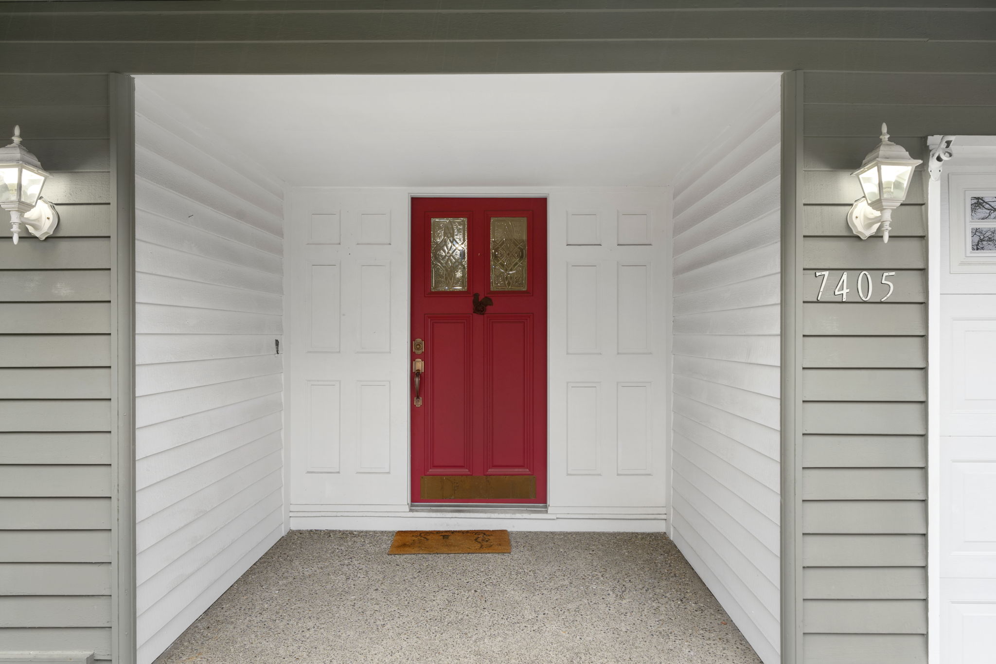 Extra large covered entry could easily hold a bistro set, rockers, or potted plants. Can you imagine all your holiday décor in this bright alcove?!
