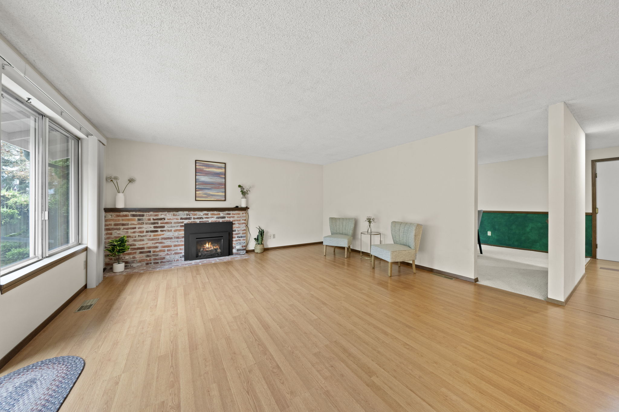 The family room features a second fireplace!
