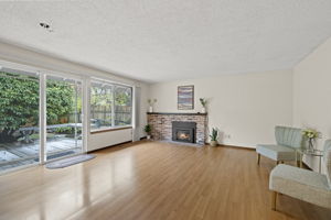 The family room provides access to the back deck and serene yard.