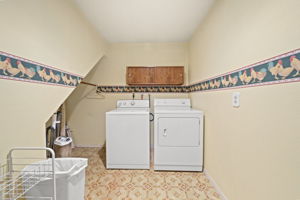The extra-large laundry room would double excellently as a craft space!