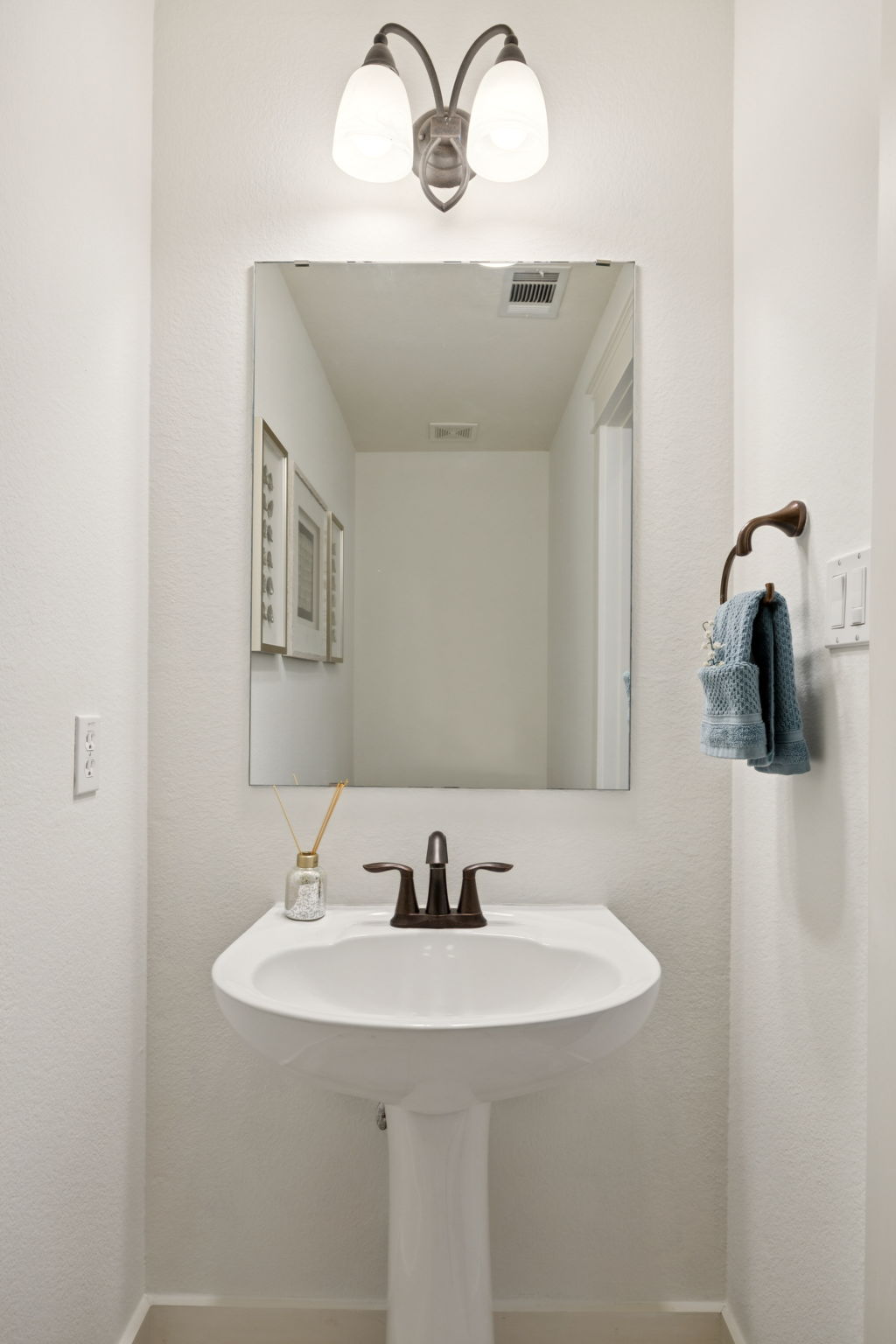 Guest bathroom off front entrance of home.