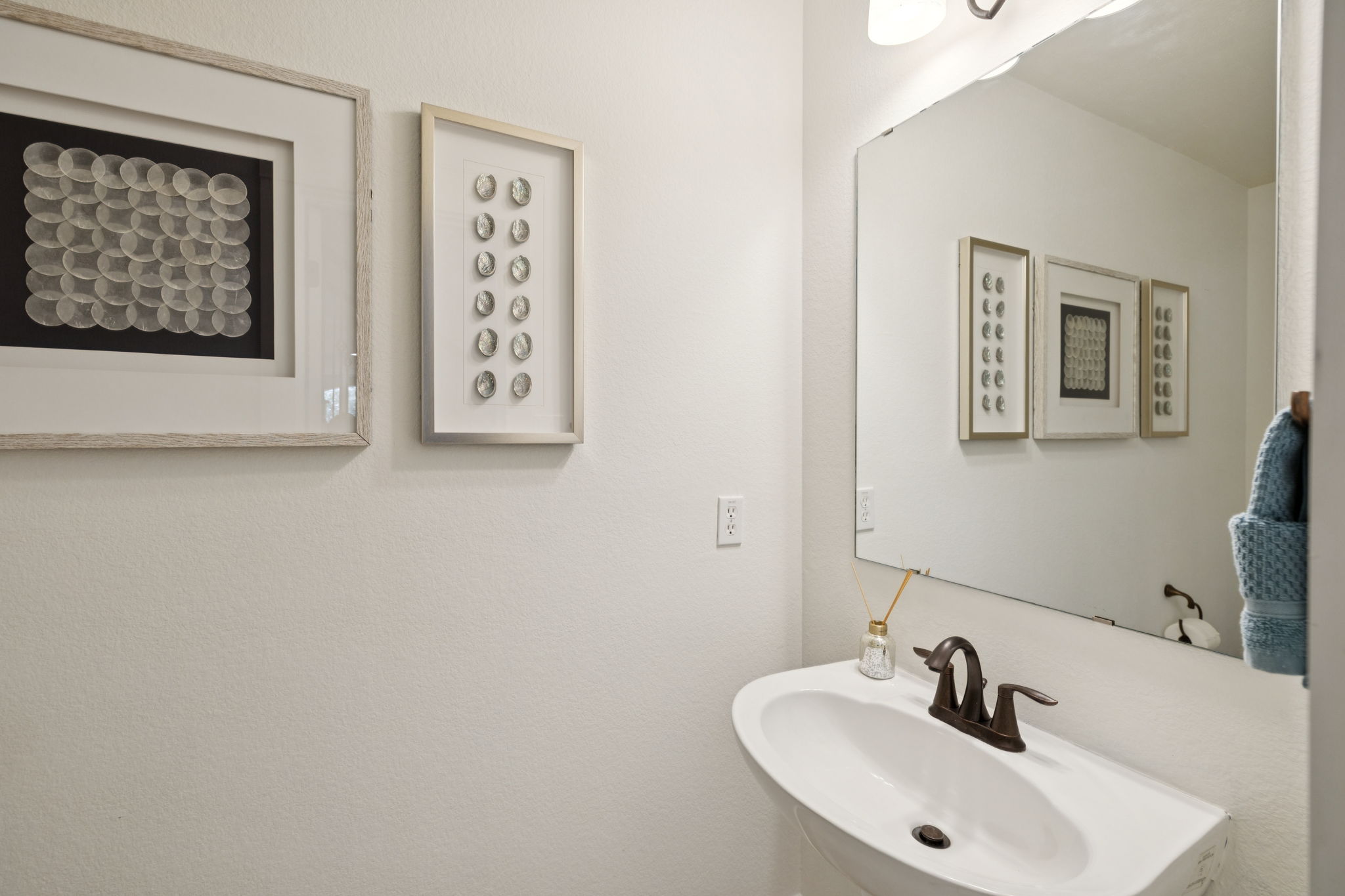 Guest bathroom off entrance of home.