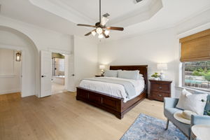 Primary bedroom with coffered ceilings