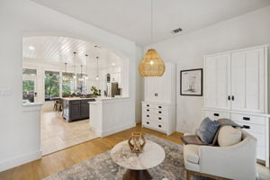 Flex space with view into the kitchen.