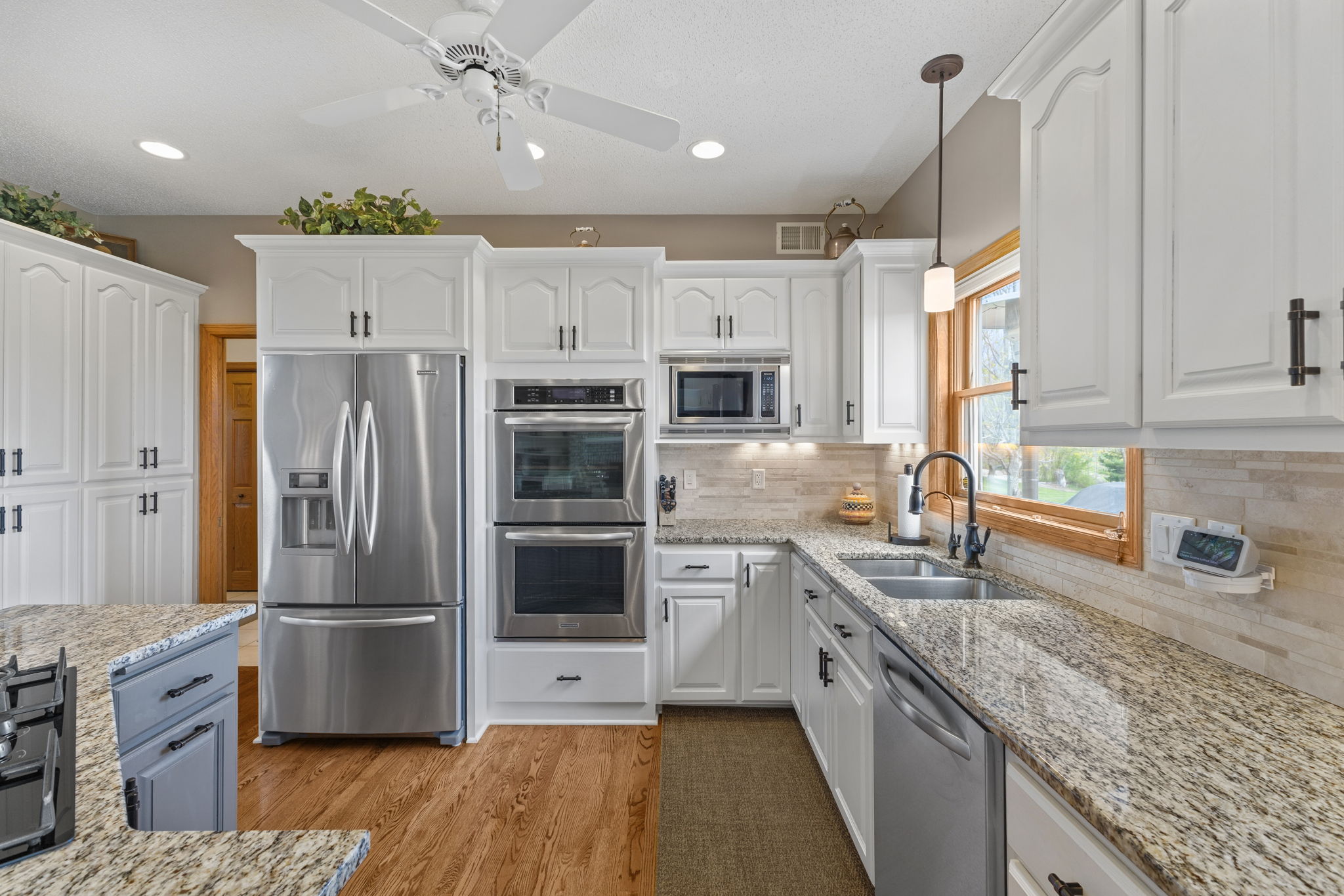 Stainless steel Kitchen-Aid appliances. Double wall oven.