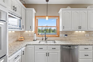 Custom cabinetry with under & over cabinet lighting