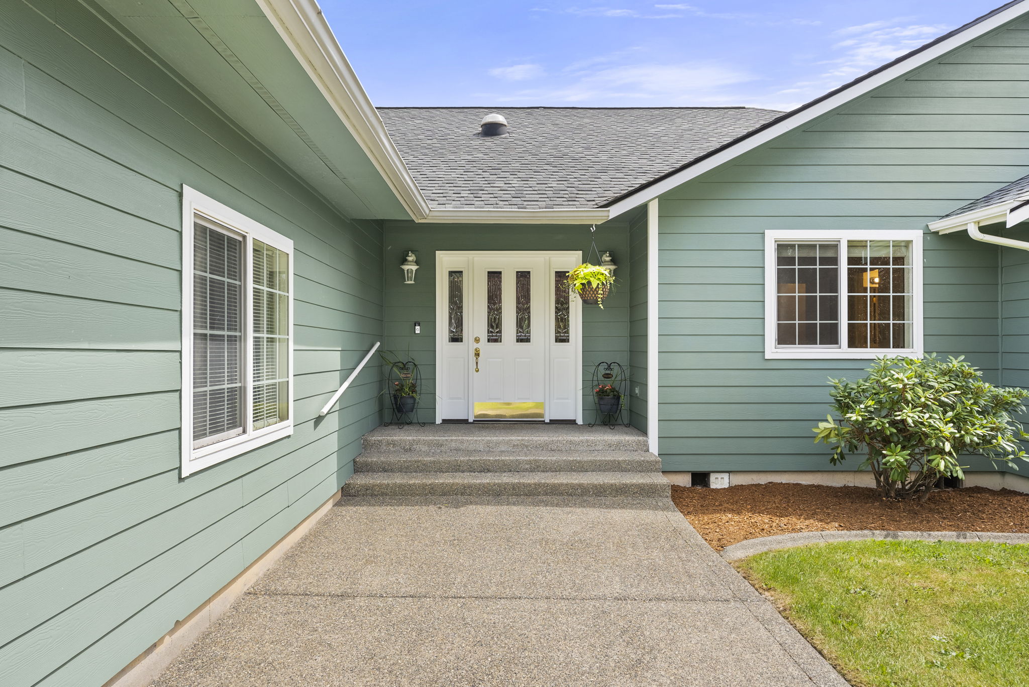Covered front porch entry welcomes you home
