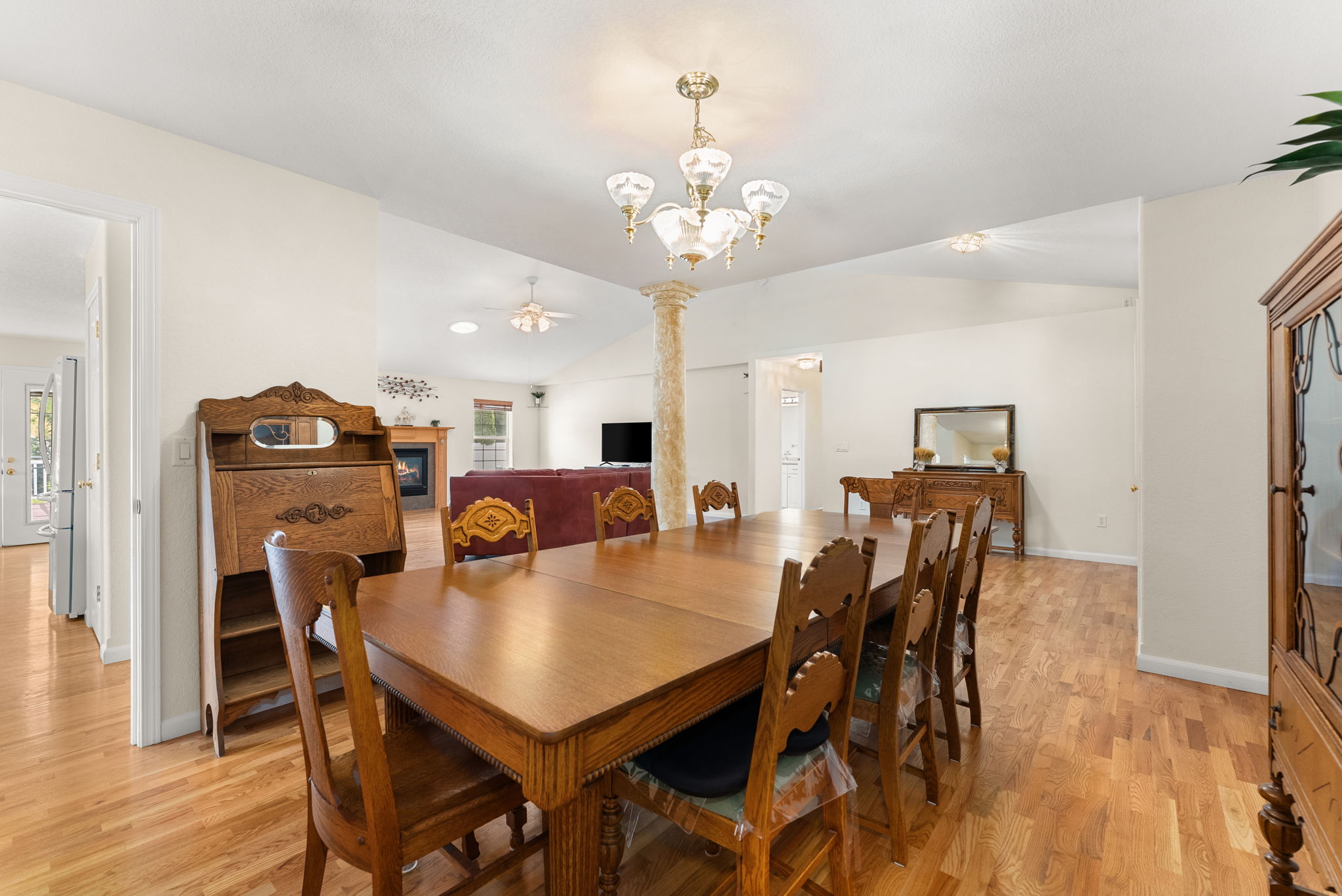 Dining area connects to the living room and kitchen, offering an open layout with a sense of separation