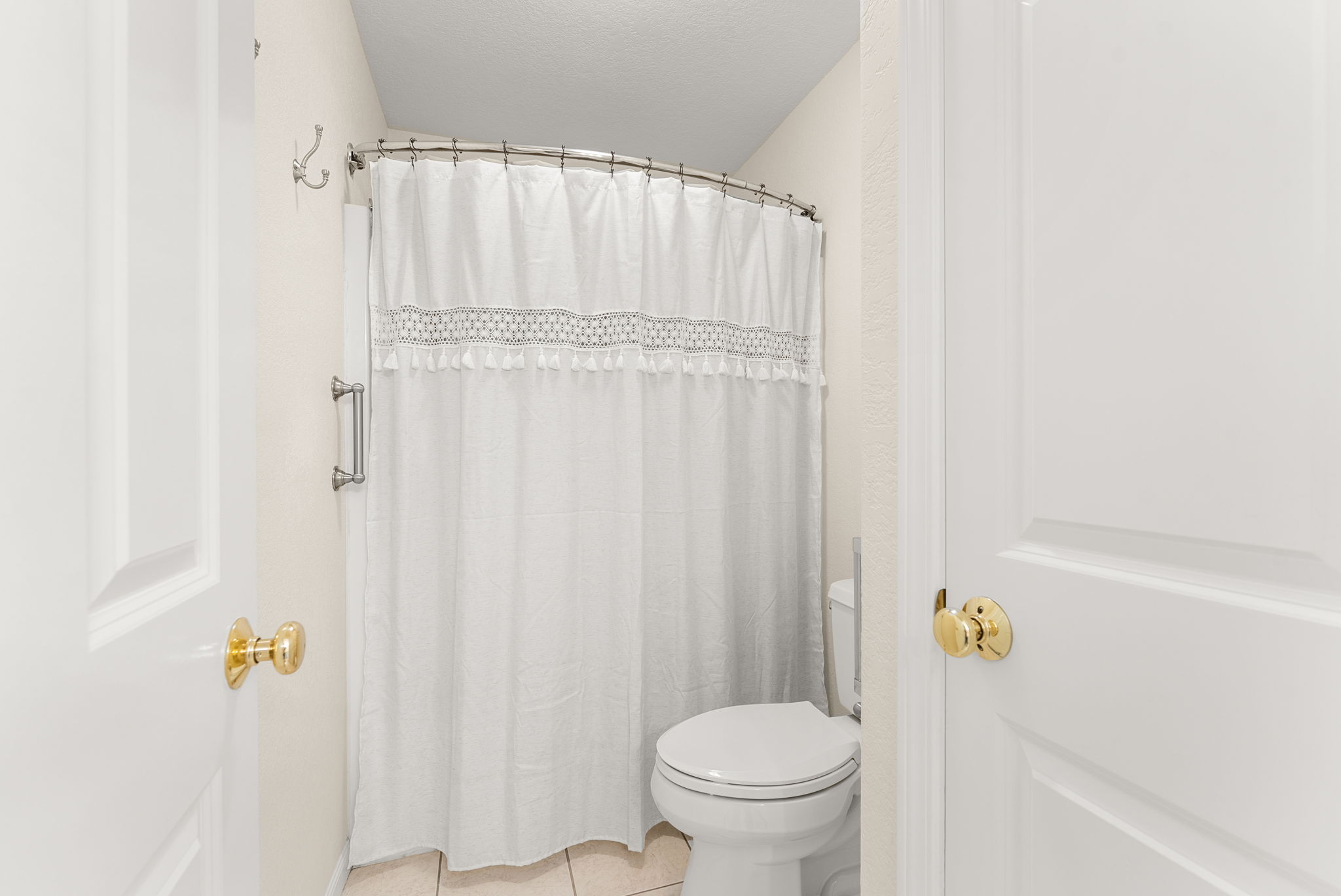 Jack-and-Jill bathroom has a private shower and toilet