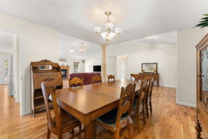 Dining area connects to the living room and kitchen, offering an open layout with a sense of separation