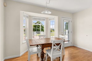 Inviting breakfast nook with outlook to the deck
