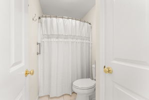 Jack-and-Jill bathroom has a private shower and toilet