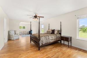 Primary bedroom with adjoining bonus room—ideal for office or sitting area