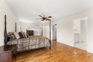 Generous primary bedroom with natural light and 5-piece bath