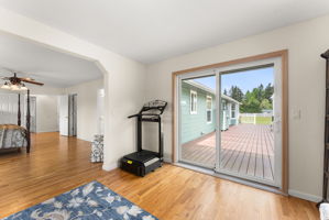 Primary suite sitting area/office with new sliding door to the deck