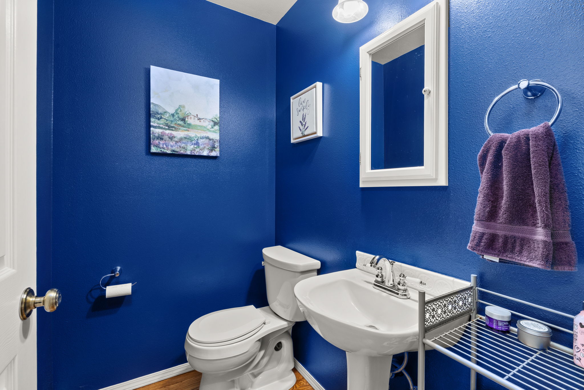 Convenient main floor half bath for guests.
