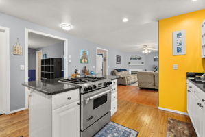 The kitchen flows effortlessly into the living room, making it easy to stay connected while cooking or entertaining.