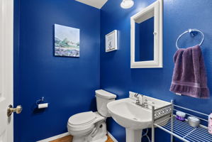 Convenient main floor half bath for guests.